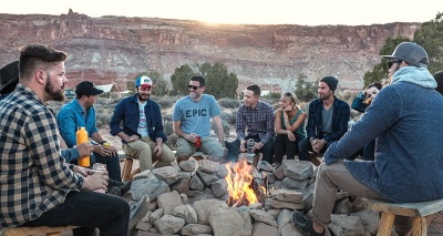 People Wealth Advisors Can Help Sitting Around a Fire